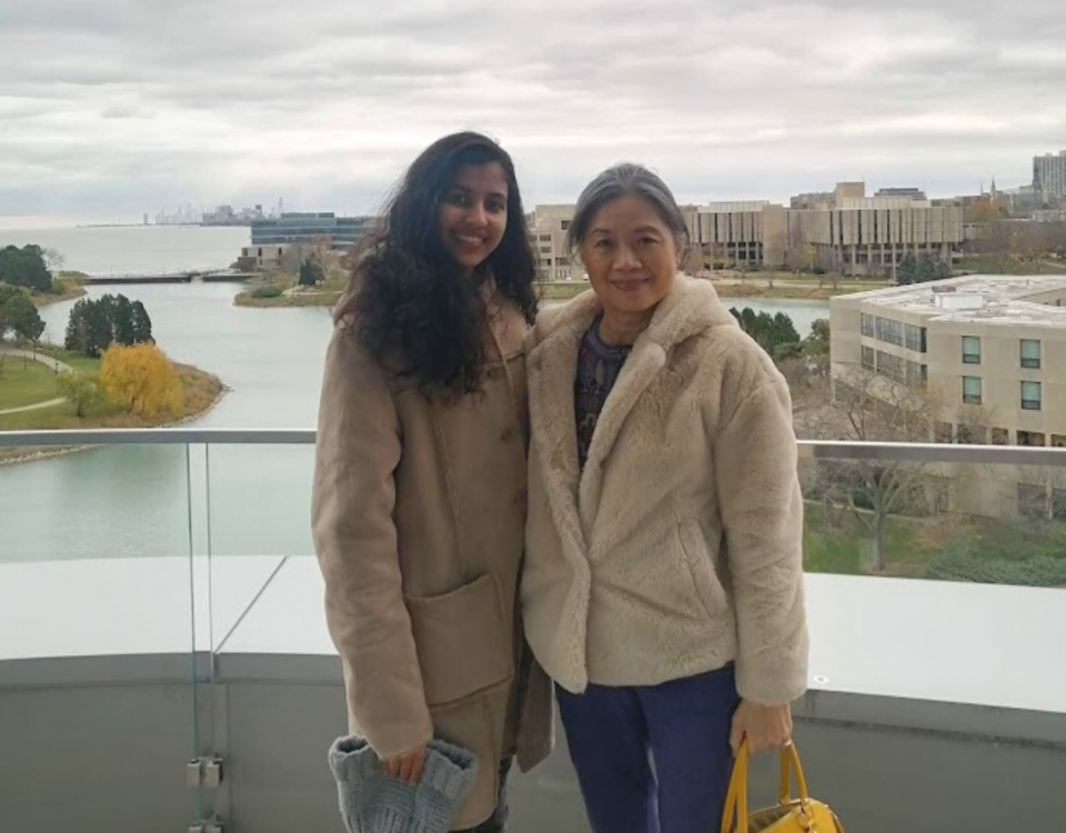 Mentor Prof Angela Y. Lee (right) with Mentee Vismaya Pillai (BSc) (left) in front of Lake Michigan at Northwestern University